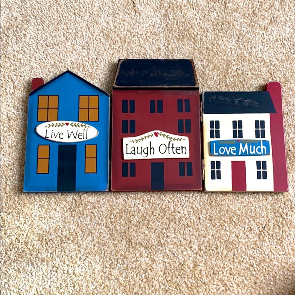 Three cute folding wooden houses